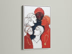 A white frame showcases women empowerment art. The artwork features diverse female portraits in red contemporary colors. This canvas print is perfect for office wall art. It is a great fit for modern or eclectic styles. The colors are red and black.