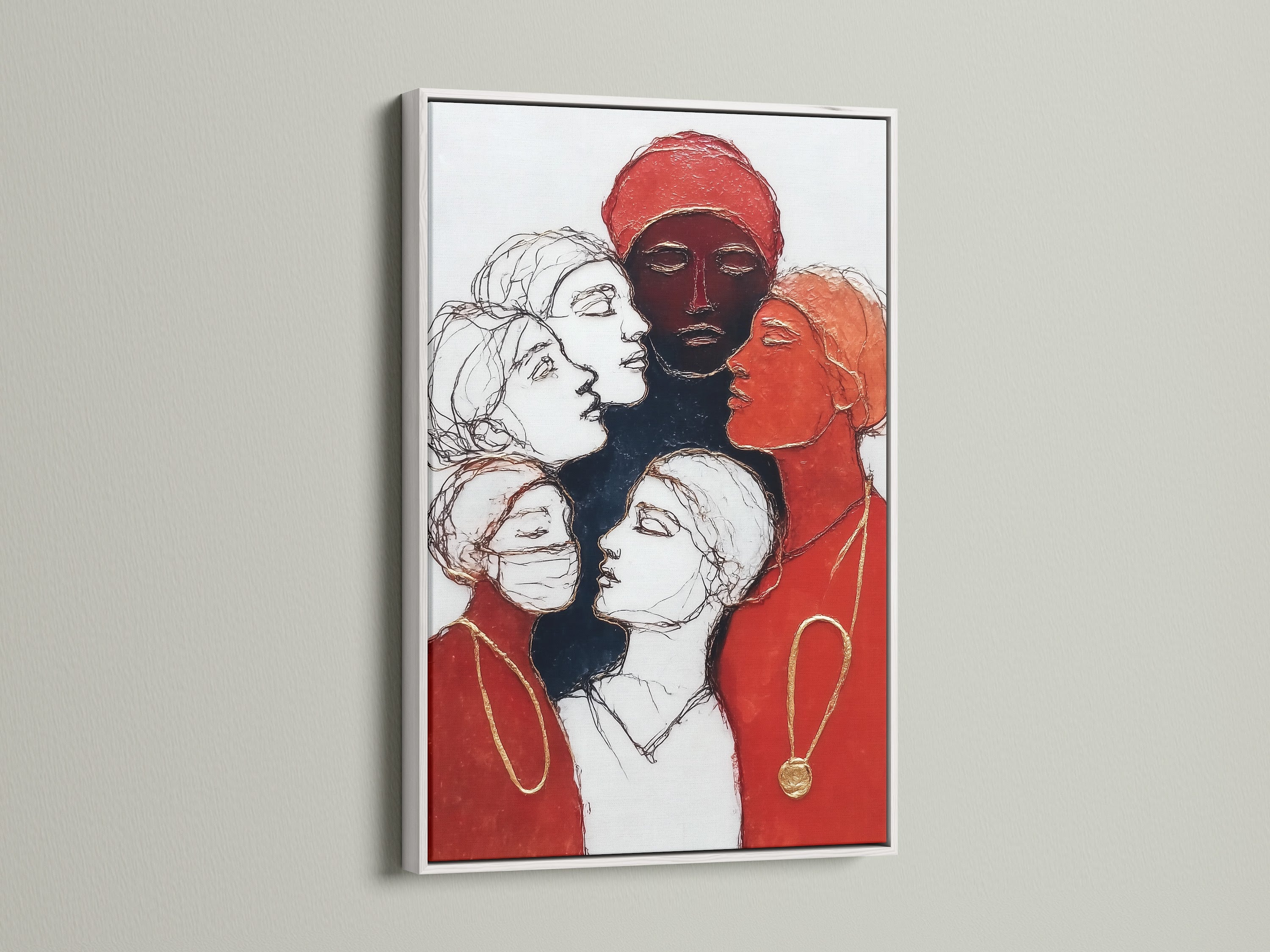 A white frame showcases women empowerment art. The artwork features diverse female portraits in red contemporary colors. This canvas print is perfect for office wall art. It is a great fit for modern or eclectic styles. The colors are red and black.