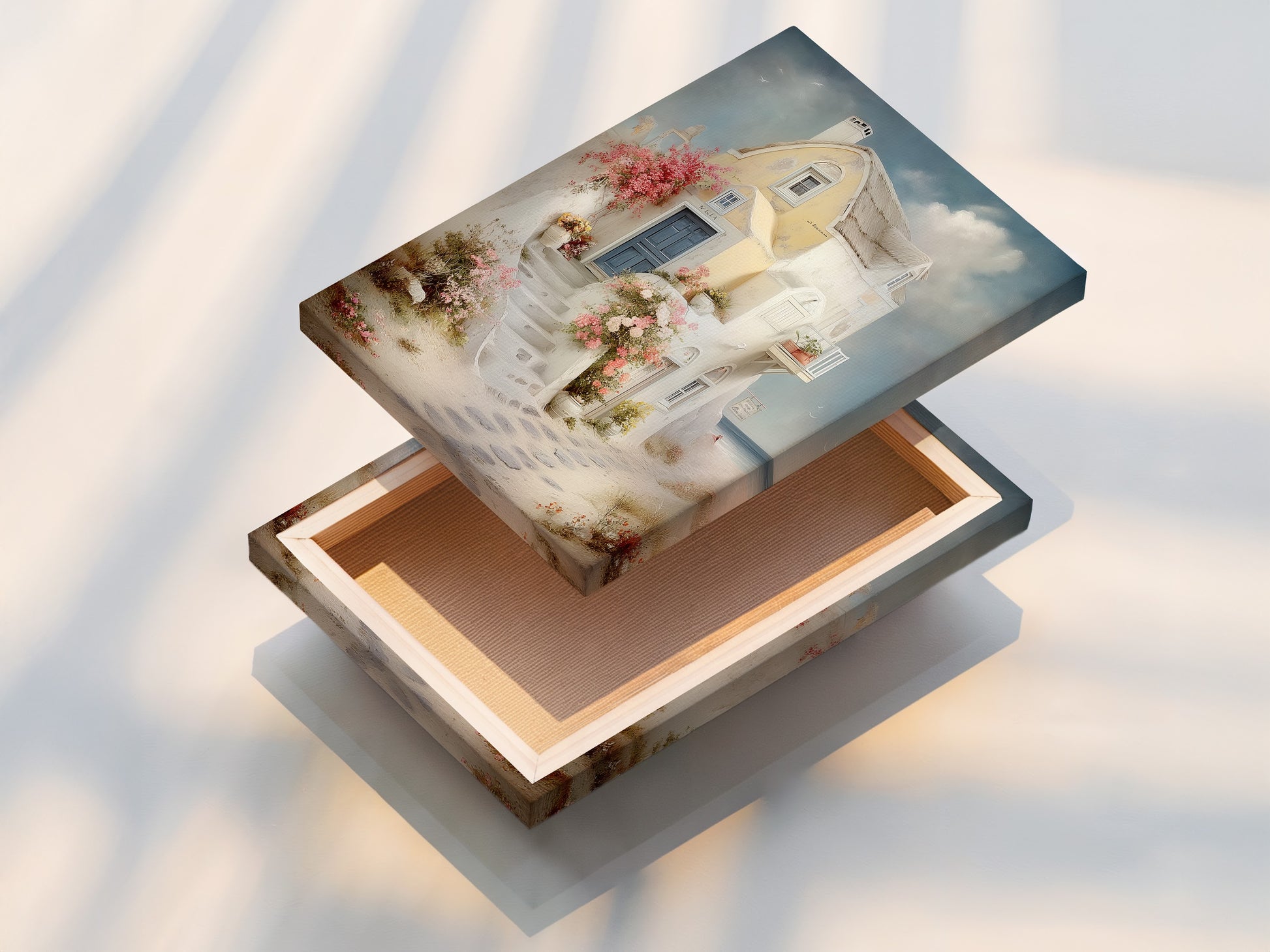 A beautifully stretched canvas print. This canvas features coastal artwork of a Mediterranean house with a blue door and floral stairway. Perfect for adding Greek island art to your vacation home decor. Ideal for living room wall art and bedroom wall decor.