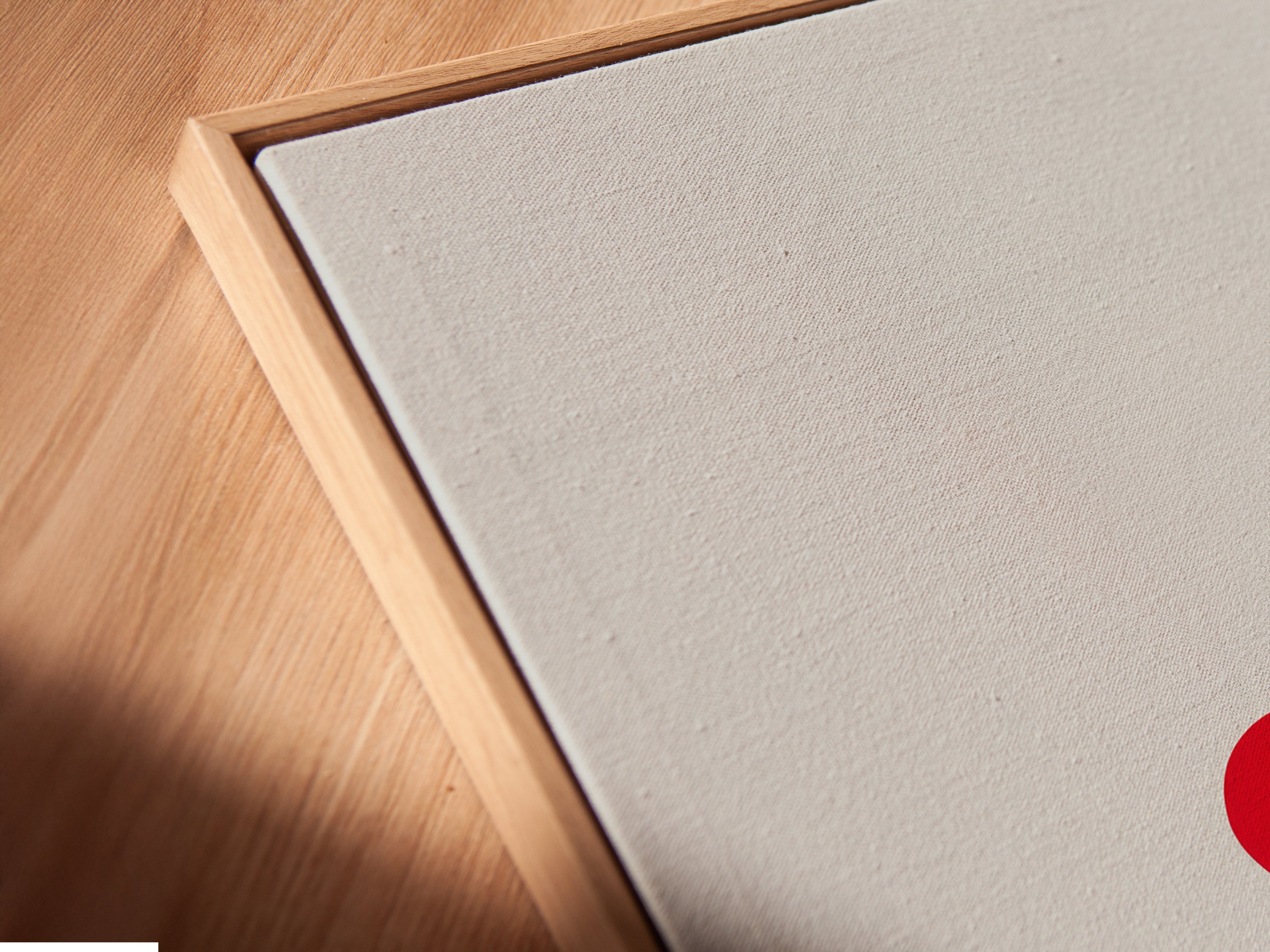 Angled close-up shows a canvas print in a floating frame. The music note heart artwork is modern and stylish. It's perfect for contemporary spaces. This minimalist music art is ready to hang.