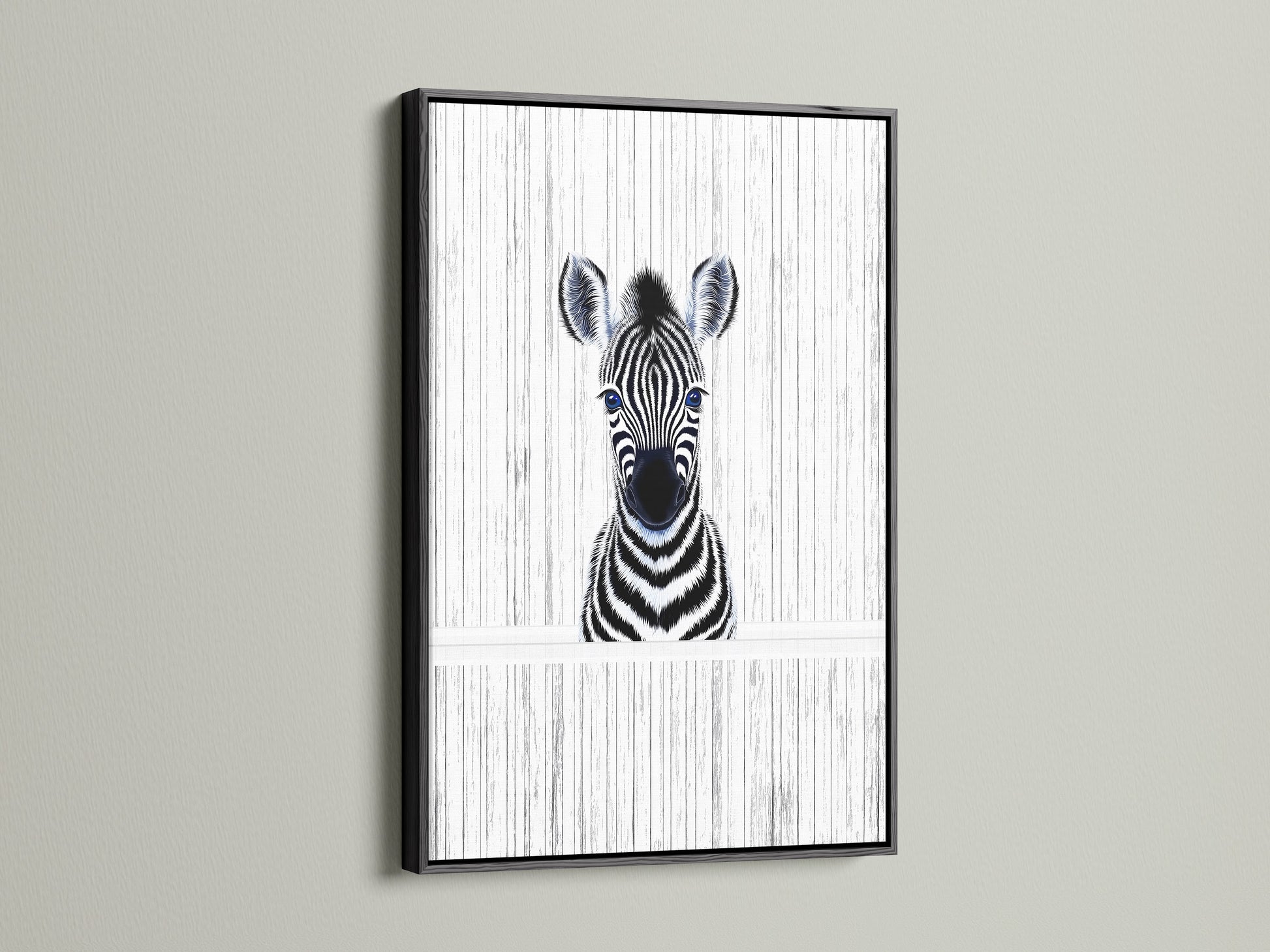 Baby Zebra artwork showcased in a black frame. This modern animal canvas is perfect for a kids room. The black frame enhances the monochrome art. It is ideal for a minimalist nursery or contemporary play area. Zebra wall art perfection.