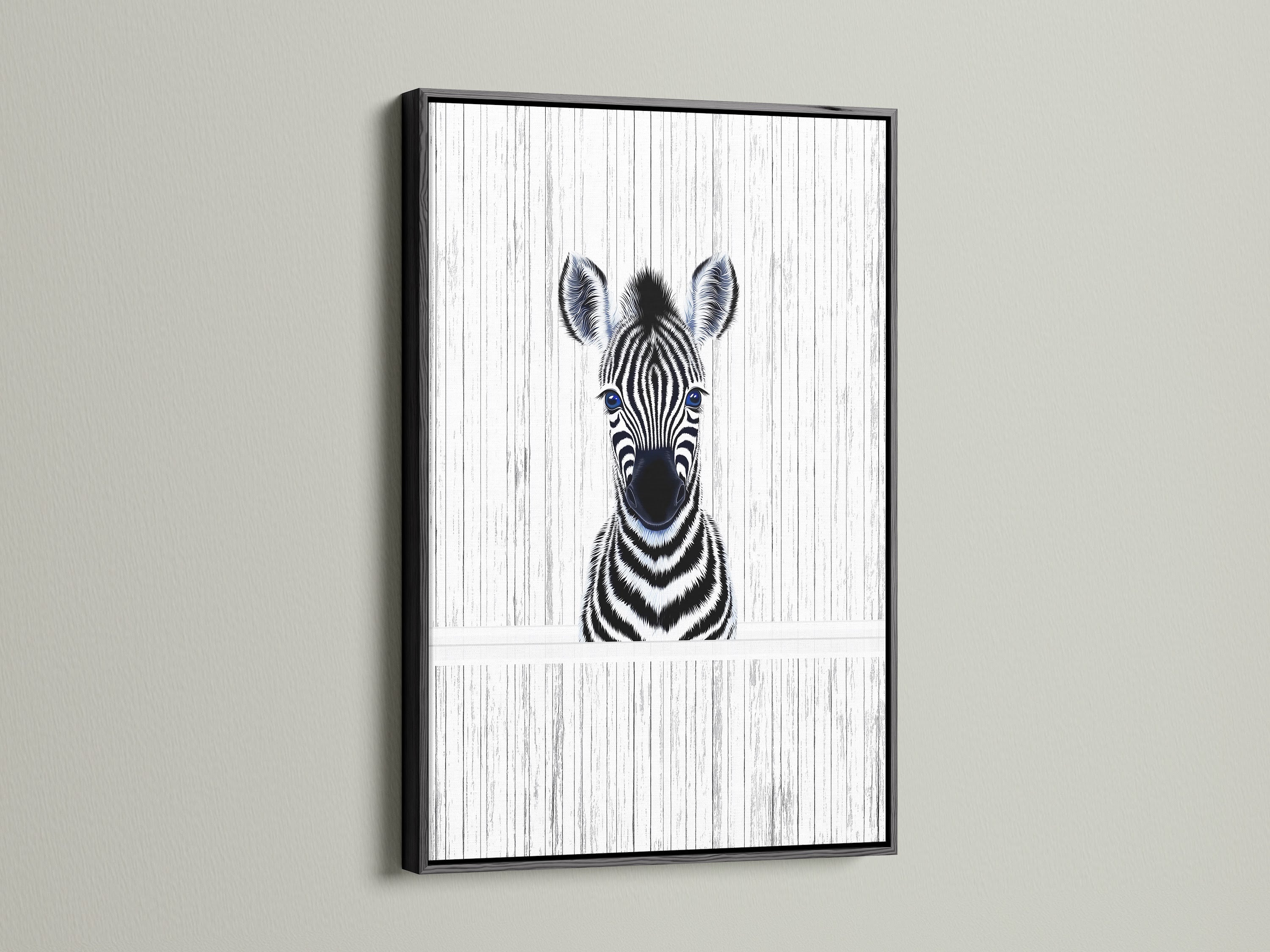 Baby Zebra artwork showcased in a black frame. This modern animal canvas is perfect for a kids room. The black frame enhances the monochrome art. It is ideal for a minimalist nursery or contemporary play area. Zebra wall art perfection.
