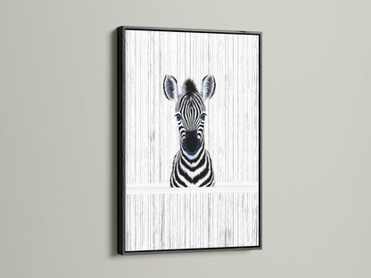 Baby Zebra artwork showcased in a black frame. This modern animal canvas is perfect for a kids room. The black frame enhances the monochrome art. It is ideal for a minimalist nursery or contemporary play area. Zebra wall art perfection.