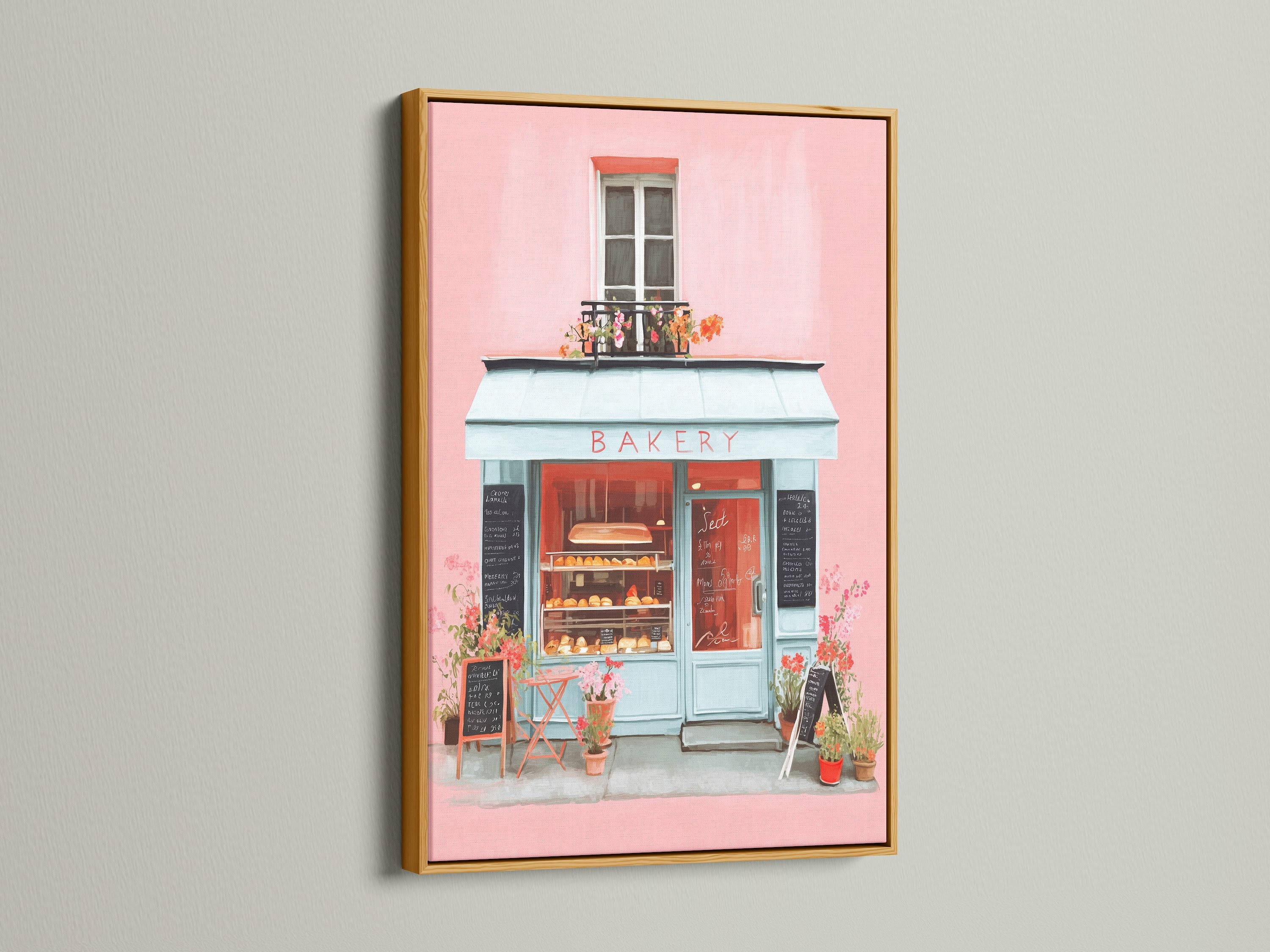 Artwork in a gold frame. The art portrays a charming bakery with pink walls and a blue storefront. The gold frame adds a touch of luxury and sophistication. This artwork is ideal for enhancing your interior with a hint of glamour and timeless style.