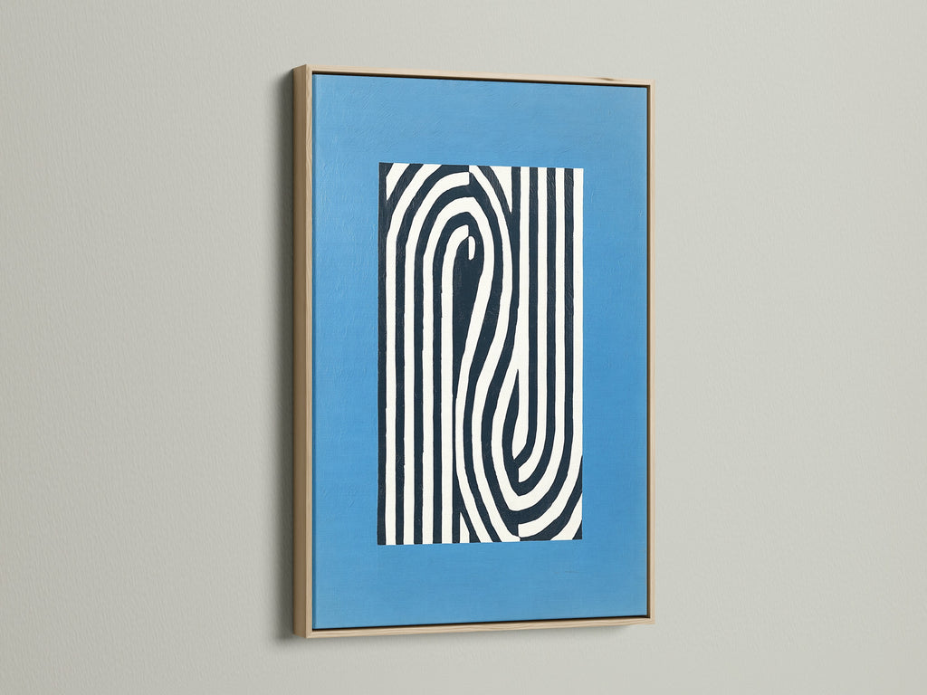 Abstract line art print displayed in an oak frame. This blue modern wall art enhances any room. The minimalist optical illusion canvas adds depth. Perfect for office decor or modern home styling. Explore our framed artwork options now.
