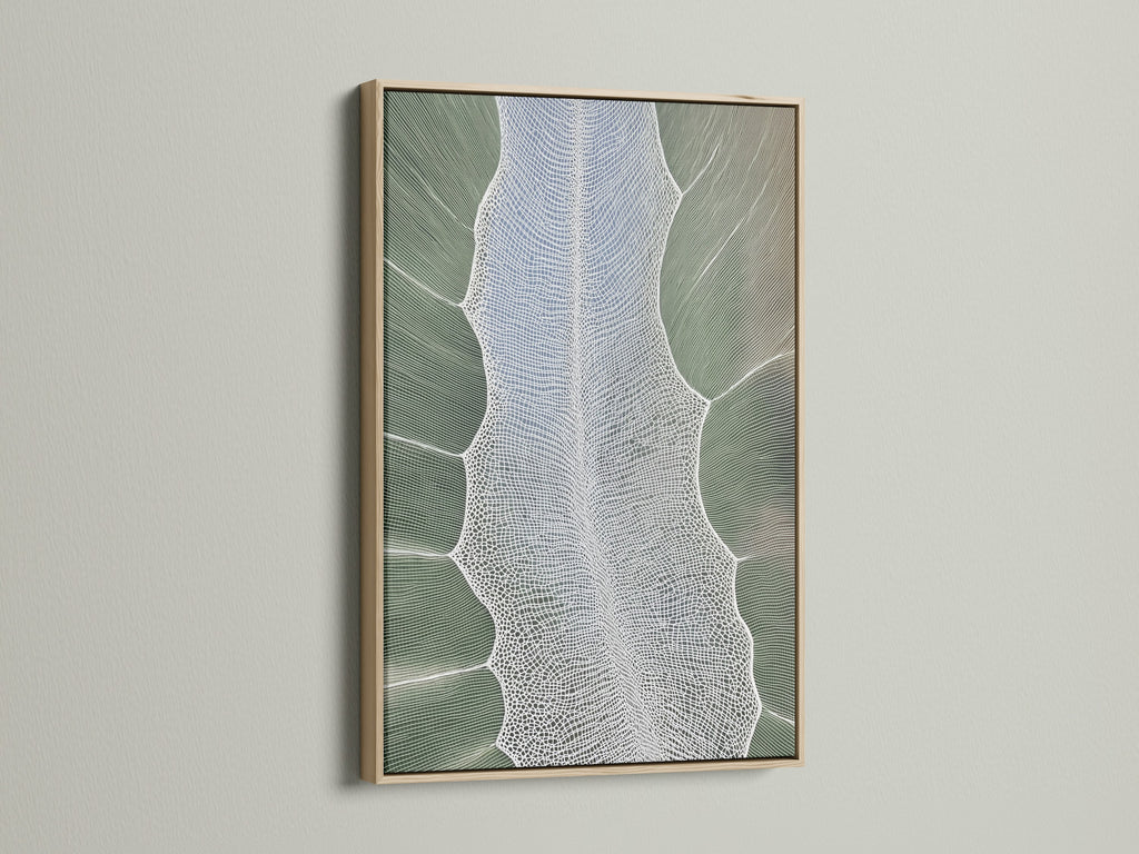 A close up of an oak frame. The frame showcases the abstract tree art. The artwork has a sage green color. It is perfect for homeowners apartment dwellers and interior stylists.
