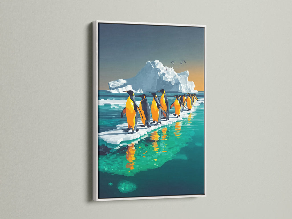 This penguin canvas art is displayed in a white frame. The arctic canvas print captures a vibrant scene of penguins and icebergs. This piece adds a touch of marine life to kids room wall art. The art suits minimalist interiors
