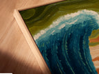 Angled close-up of a canvas print in a floating frame. The frame creates a unique shadow effect. The canvas appears to float within the frame. A modern and stylish way to display art. This presentation adds depth and dimension.