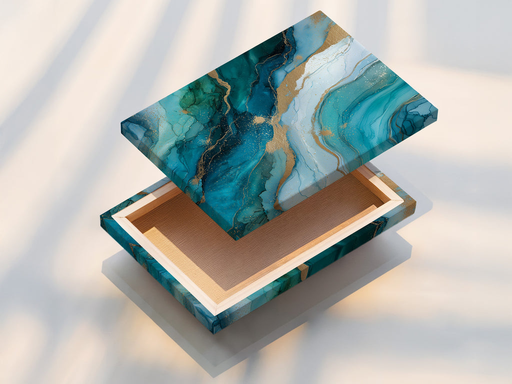 This is a stretched canvas print of the abstract ocean artwork. It features teal blue and gold details. The stretched canvas provides a gallery ready look. Enhance your living room or bedroom with this modern canvas. It is perfect for any space.