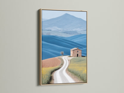 Tuscan Landscape canvas print in an oak frame. The art showcases rolling hills and a charming farmhouse scenery. Ideal for adding a rustic touch to your living room or bedroom. The oak frame enhances the artwork's warm tones. Perfect for those seeking farmhouse wall art.
