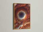 Geode Art Print in a gold Frame. The artwork is a Rust Orange Agate Wall Art. A Modern Crystal Canvas Print perfect for Office Decor. Abstract Mineral Artwork to enhance your space.