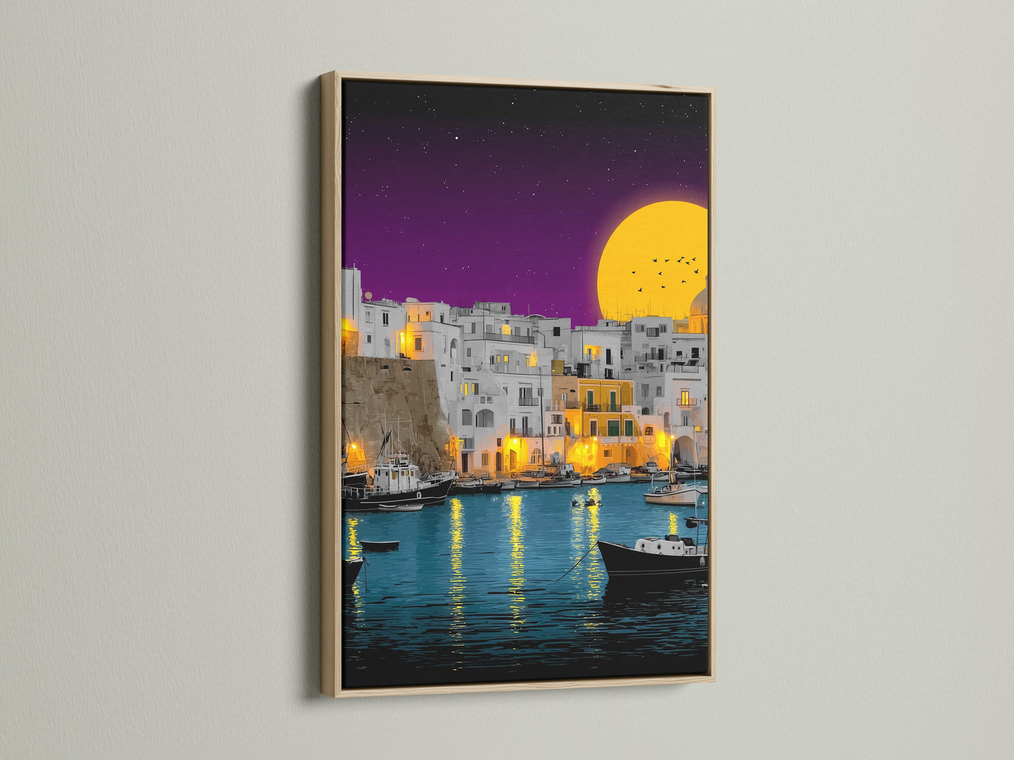 This oak frame enhances the coastal village artwork. The artwork features a Mediterranean harbor scene. Teal waters reflect the evening light. It is ideal for living rooms bedrooms and offices. It adds a touch of coastal scenery to any space.