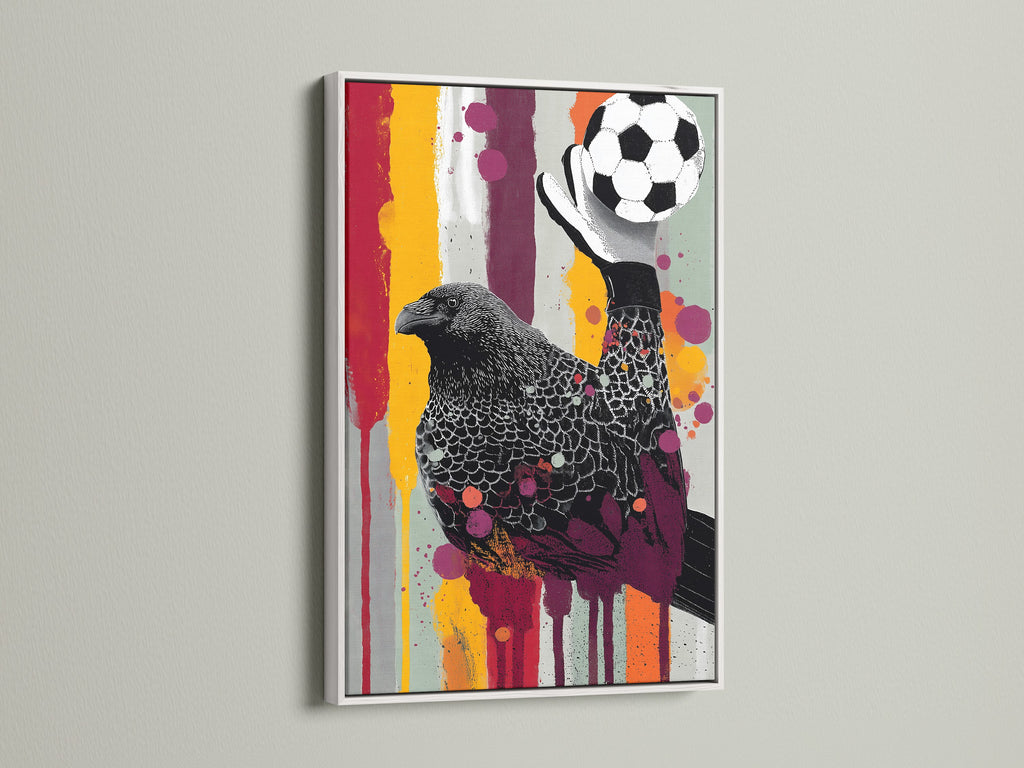 Raven Goalkeeper artwork with a white frame. This sports-themed wall decor is great for kids. This art is perfect for nurseries or playrooms. It is unique sports artwork for boys. Add this bird art to your kid's space.