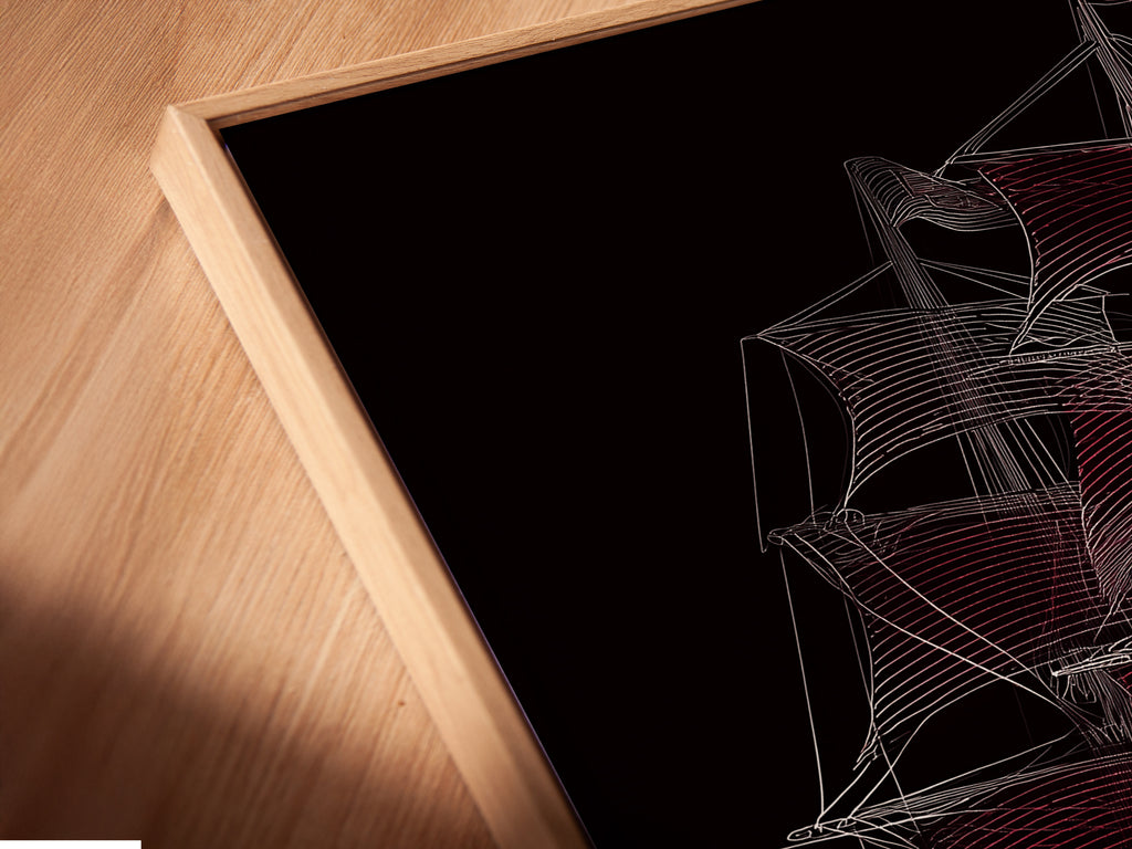 Close-up of a Sailing Ship Canvas Print in a Floating Frame. The nautical artwork features a vessel wall art piece. This line art poster enhances any coastal office decor. A stylish sailor gift.