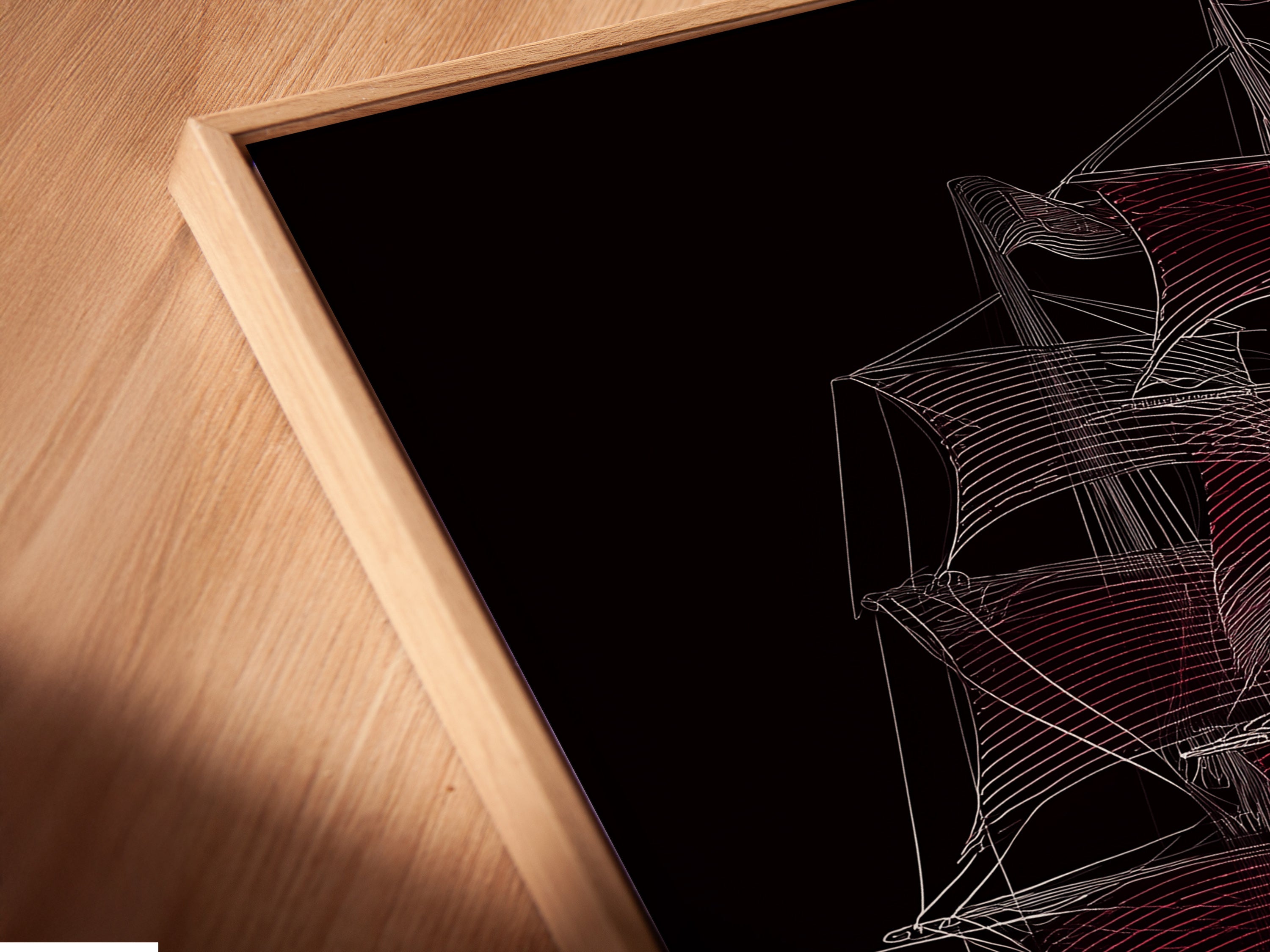 Close-up of a Sailing Ship Canvas Print in a Floating Frame. The nautical artwork features a vessel wall art piece. This line art poster enhances any coastal office decor. A stylish sailor gift.