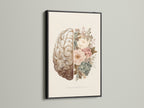 Floral brain art print displayed in a sleek black frame. The black frame highlights the intricate details of the artwork. The half brain half flower art print is visually appealing. Enhance your living space with this contemporary framed artwork option.