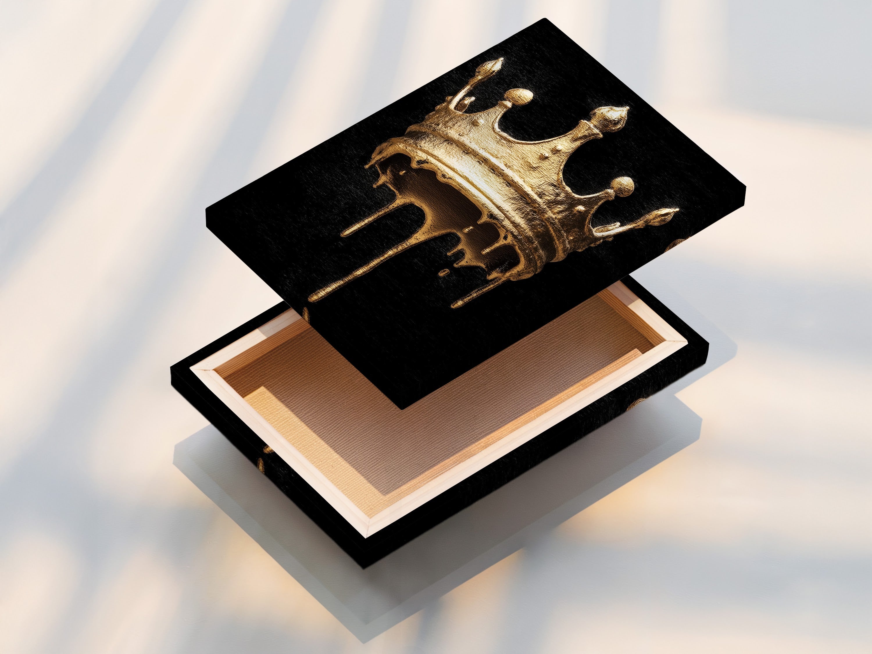 A stretched canvas print of the Melting Crown artwork. The artwork features a gold melting crown on a black background. The stretched canvas offers a gallery-ready look. Shop modern royalty art now.