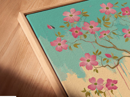This is a close-up view of a canvas print in a floating frame. The floral blossom artwork features pink flowers and birds. The floating frame adds depth and dimension. The artwork looks more elegant and luxurious.