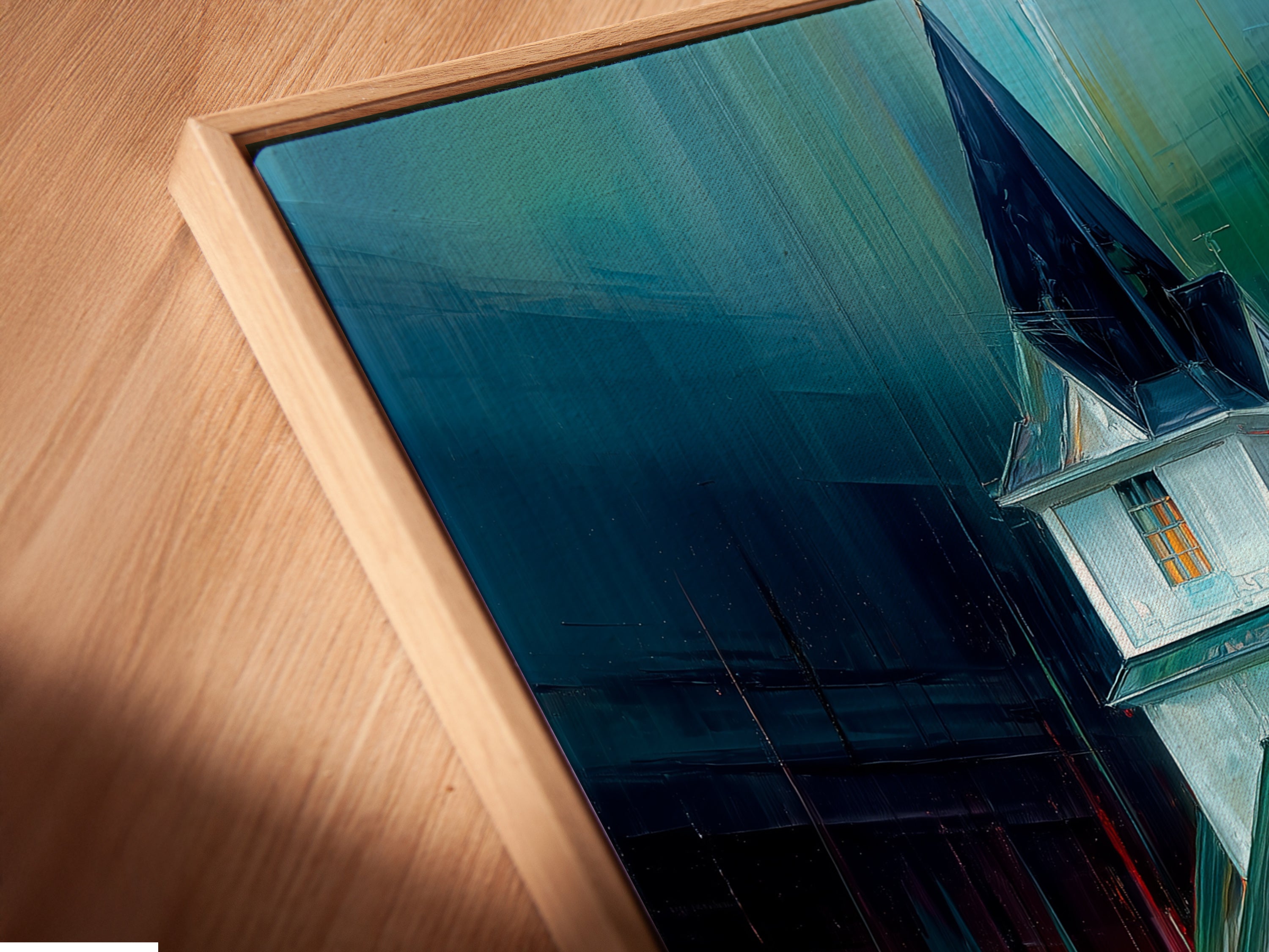 A close-up of the Church at Night Canvas Print in a floating frame. The floating frame adds depth and dimension to the religious artwork. The teal and orange colors create a calming night scene print. This modern art piece is perfect for office wall decor. Enhance your space with this architectural art.