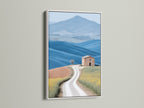 Tuscan Landscape artwork in a white frame. This fine art print captures the beauty of the Italian countryside. The white frame provides a clean modern look. It complements the yellow and blue hues in the artwork. Consider this piece for your home decor prints.