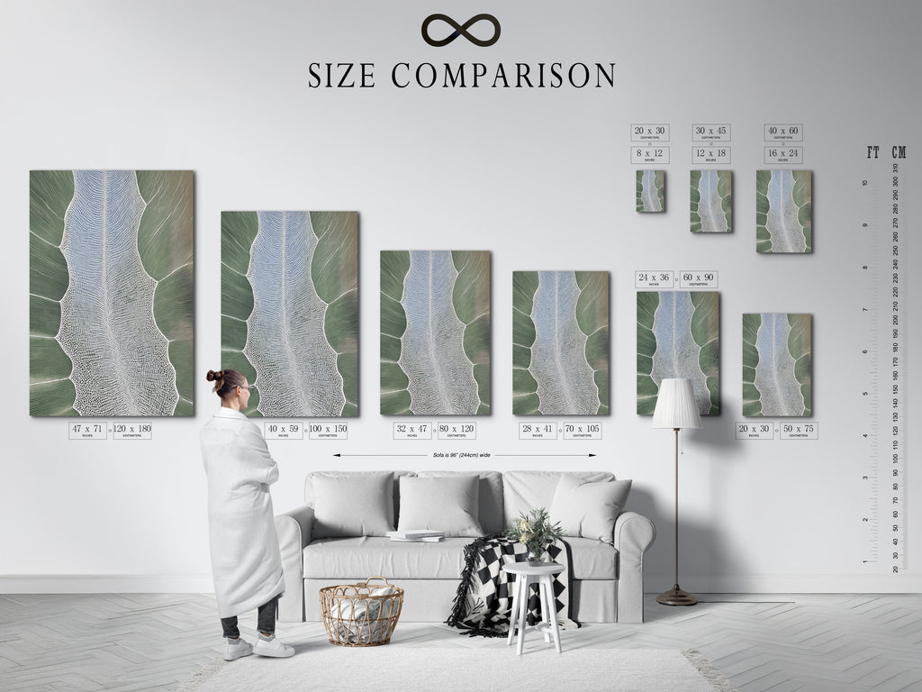 A size comparison chart in an interior setting. It shows various sizes of abstract tree artwork. The chart helps visualize the art in different spaces. Perfect for planning your wall decor.
