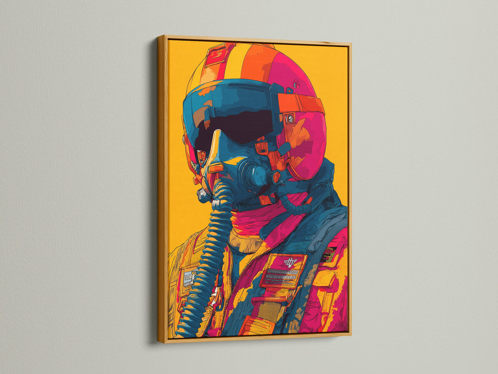 Artwork in a gold frame is showcased on a white wall. The art features a pilot with a helmet and mask. The gold frame brings a touch of elegance. This piece is a luxurious addition to your space.
