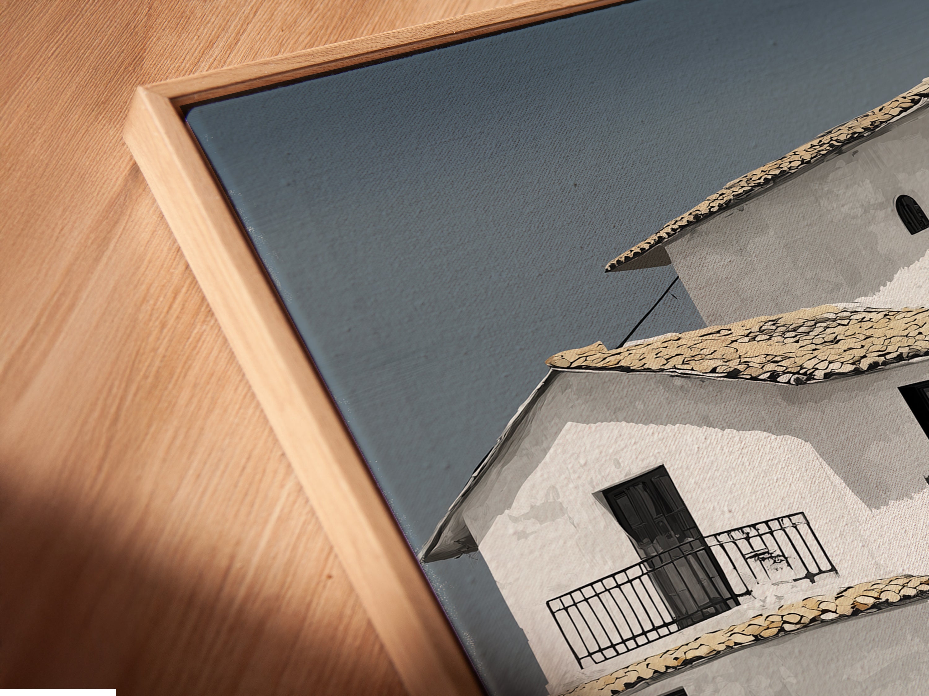 Close-up of a canvas print in a floating frame showcasing Mediterranean house artwork. The minimalist white building art enhances any space. Perfect for coastal wall art enthusiasts. Discover the beauty of our architecture print. Shop now for unique art.