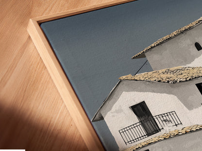 Close-up of a canvas print in a floating frame showcasing Mediterranean house artwork. The minimalist white building art enhances any space. Perfect for coastal wall art enthusiasts. Discover the beauty of our architecture print. Shop now for unique art.