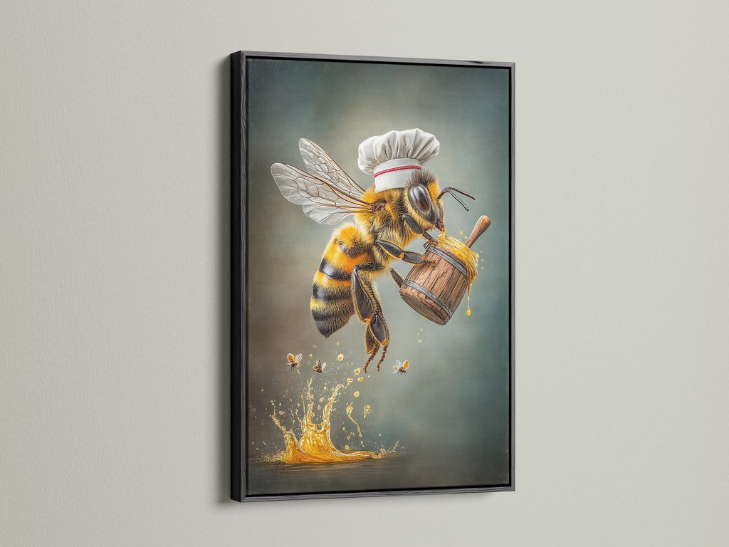 Chef Bee artwork presented in a black frame. This kitchen wall art features a bee canvas print. It is ideal for adding a quirky touch to your dining room or restaurant. This honey bee decor is perfect for country and farmhouse styles.