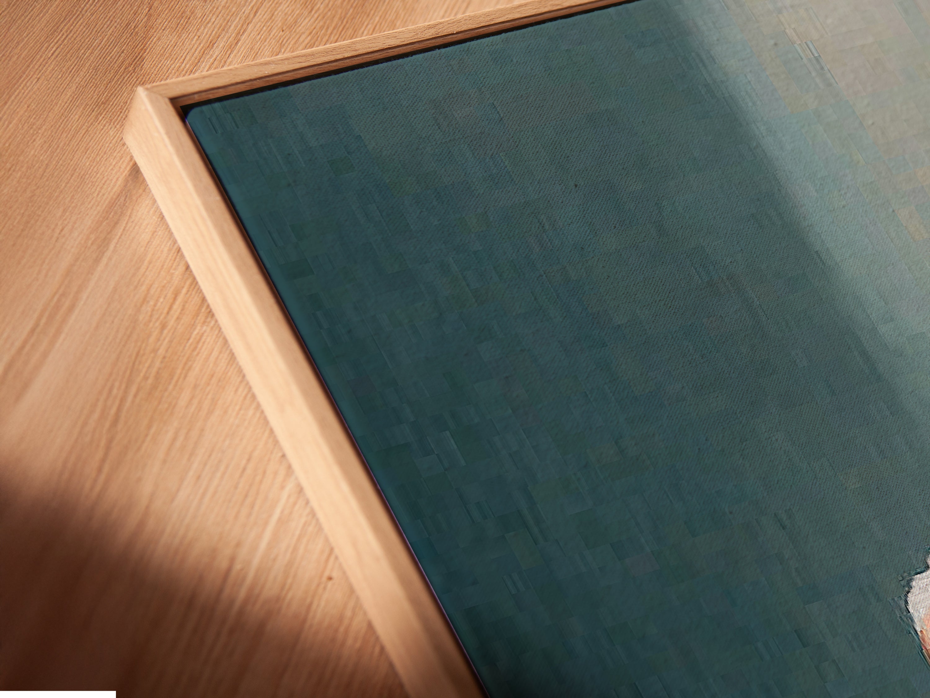 Angled close up of a canvas print in a floating frame. View the texture and detail of our rustic man with guitar artwork. It is perfect for adding vintage style to any room today