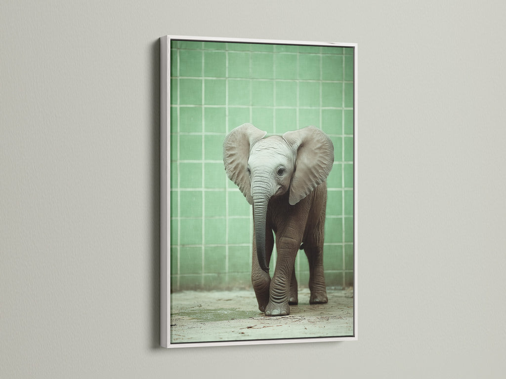 Baby Elephant artwork displayed in a white frame. This artwork brings a modern touch to nursery wall art. Discover our range of kids room decor. This neutral tone art complements any safari nursery theme.