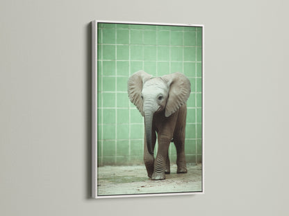Baby Elephant artwork displayed in a white frame. This artwork brings a modern touch to nursery wall art. Discover our range of kids room decor. This neutral tone art complements any safari nursery theme.