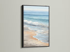 Seascape artwork with a black frame. This ocean canvas adds a modern touch to any space. Ideal for bathroom wall decor or coastal office art. The beach decor brings a sense of tranquility. A perfect coastal painting.