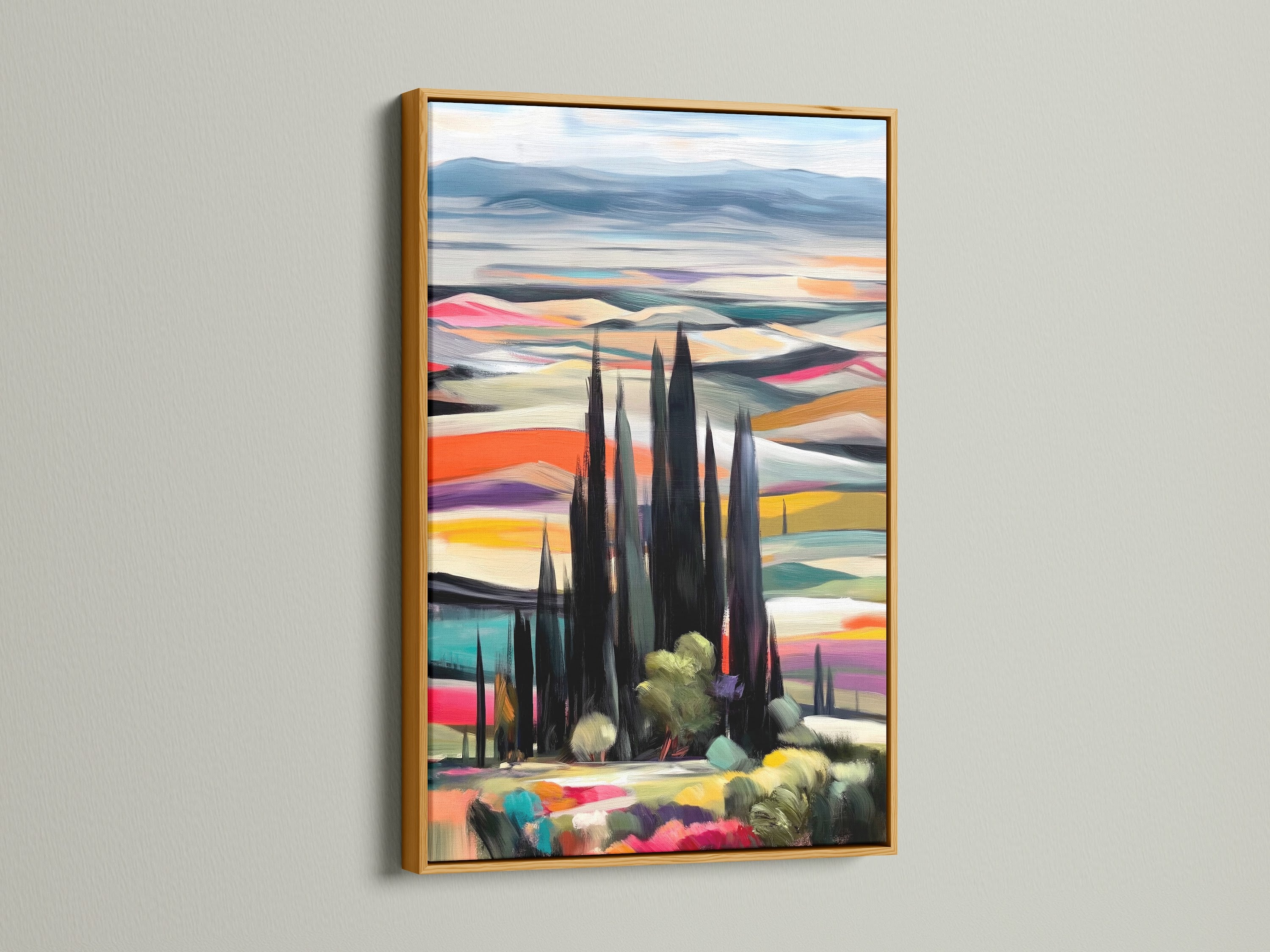 The Tuscan Landscape artwork is beautifully displayed in a gold frame. This colorful wall art captures the essence of the Italian countryside. The gold frame enhances the artwork's vibrancy. Add a touch of elegance to your home decor with this stunning landscape artwork. Perfect for any space.