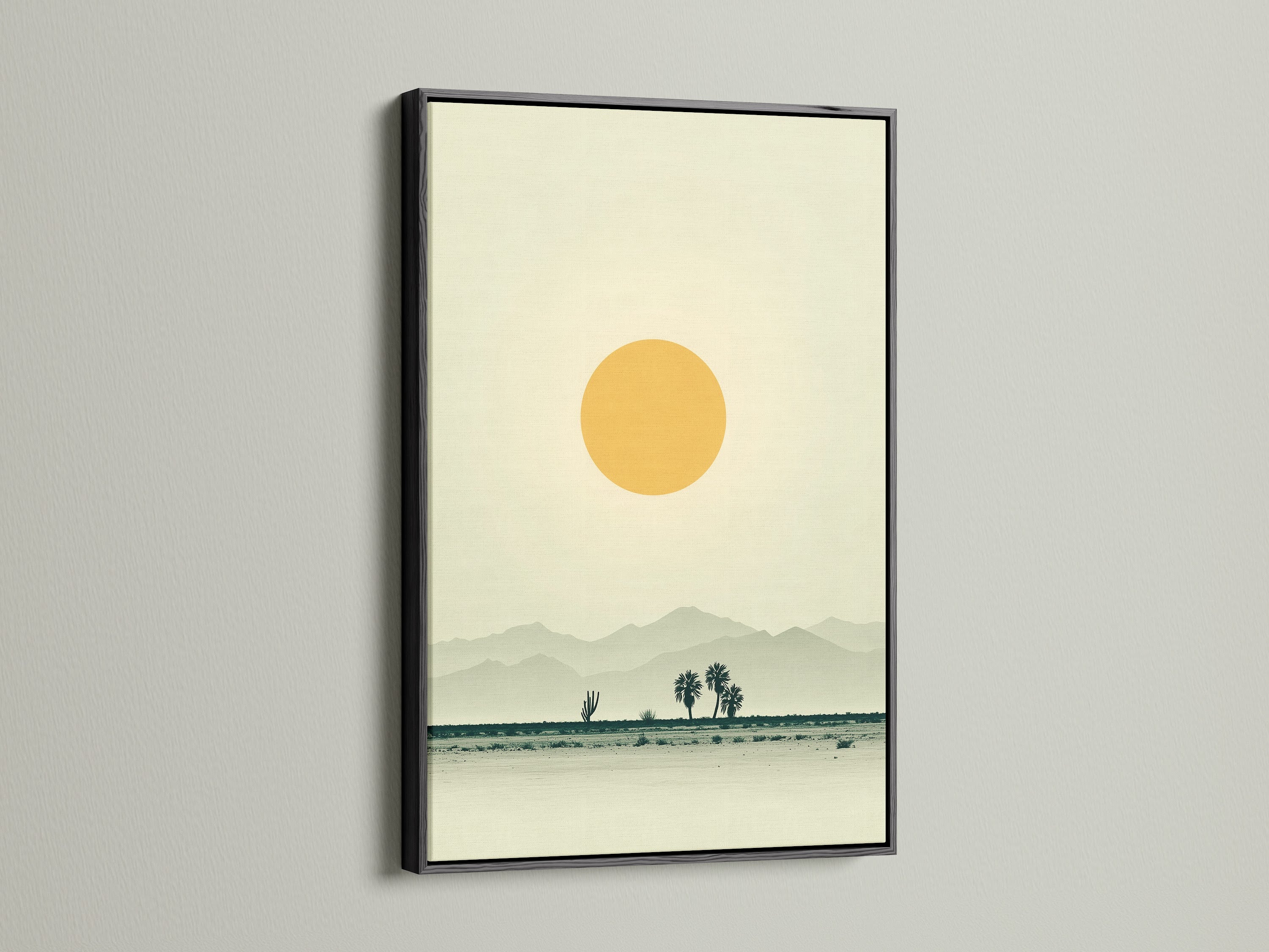 The desert landscape canvas print is in a black frame. This minimalist wall art features warm earth tones. It brings southwestern decor to a home office. The artwork creates a calming and inviting atmosphere. It is a subtle statement piece.