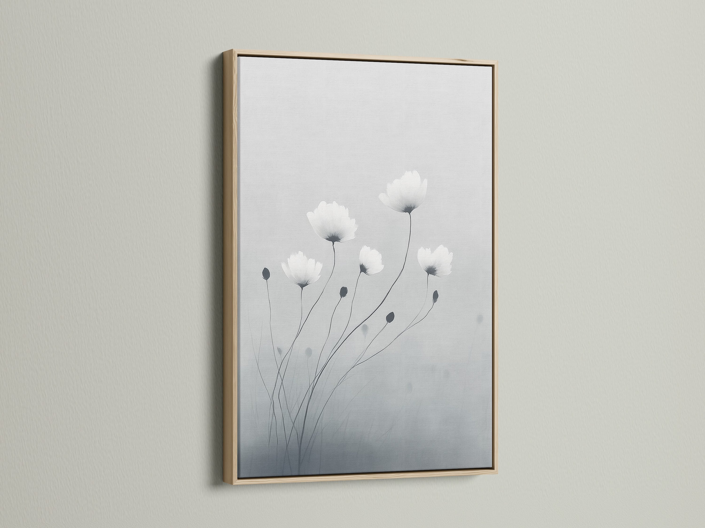 This minimalist flower artwork is framed in oak. The soft gray and white botanical print offers a serene touch. It enhances bedroom decor or any space needing a modern canvas art piece. Oak frames add a natural element and elevate minimalist wall art.