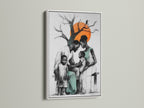 Modern black family artwork displayed in a white frame. The teal and orange abstract art is perfect for any home decor. This family canvas print is perfect for any home decor. Displayed in a living room setting. Perfect for nurseries too.