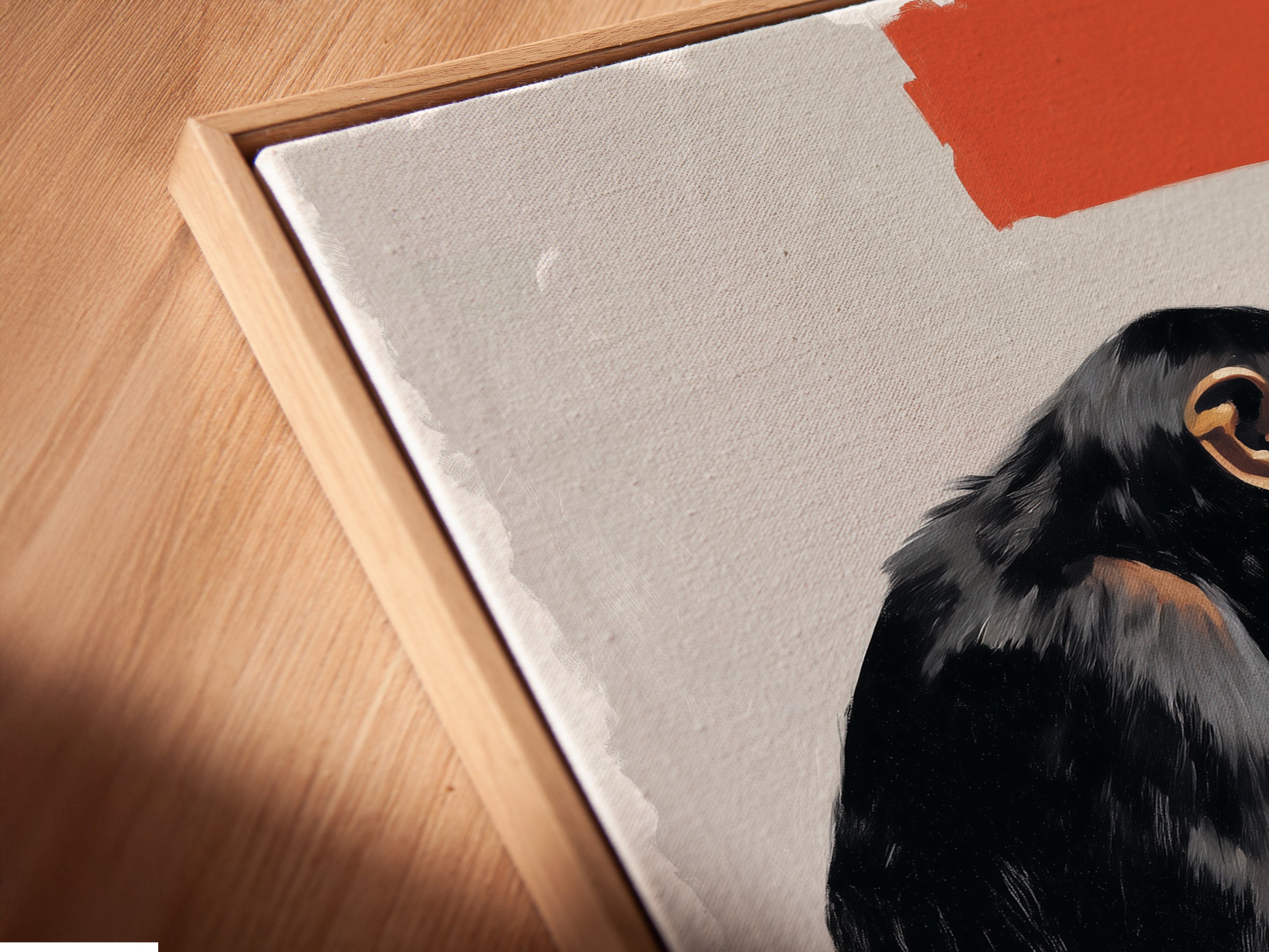 A close-up angled view of a canvas print in a floating frame. The artwork features a monkey at a computer. This contemporary piece is perfect for modern office decor. The floating frame enhances the artwork. It gives a sleek and stylish look to this humorous primate artwork. This canvas is ideal for tech startups.