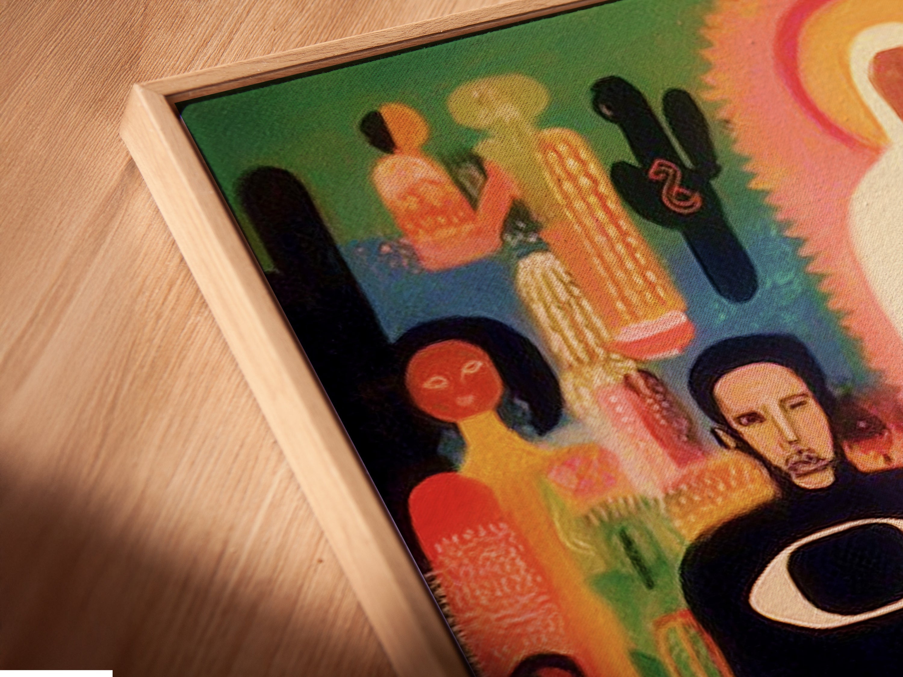 Close-up of a canvas print in a floating frame. The folk art piece showcases mystical spiritual elements. The abstract faces art is vibrant and captivating. The floating frame enhances the artwork's modern appeal. It is ready to hang.