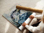 A woman carefully rolls a fine art poster paper. The paper is high quality. It ensures your artwork looks its best. Our fine art paper is ideal for prints. Preserve your art with us.