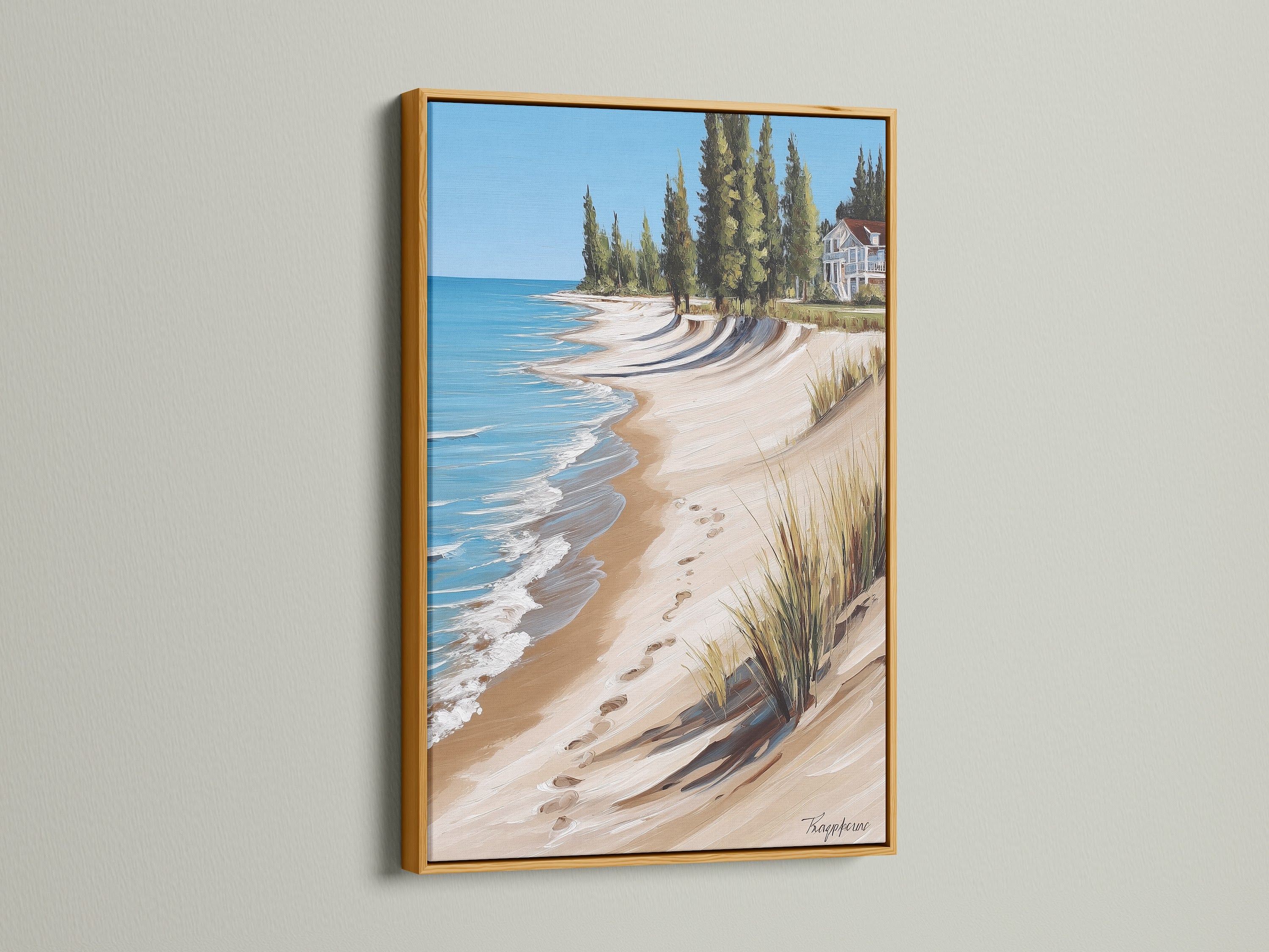 Coastal Beach House Artwork in a Gold Frame. This artwork displays a luxurious ocean view with a sandy shoreline. Elevates any room with elegant seascape painting. Ideal for living room wall art and bedroom wall decor.