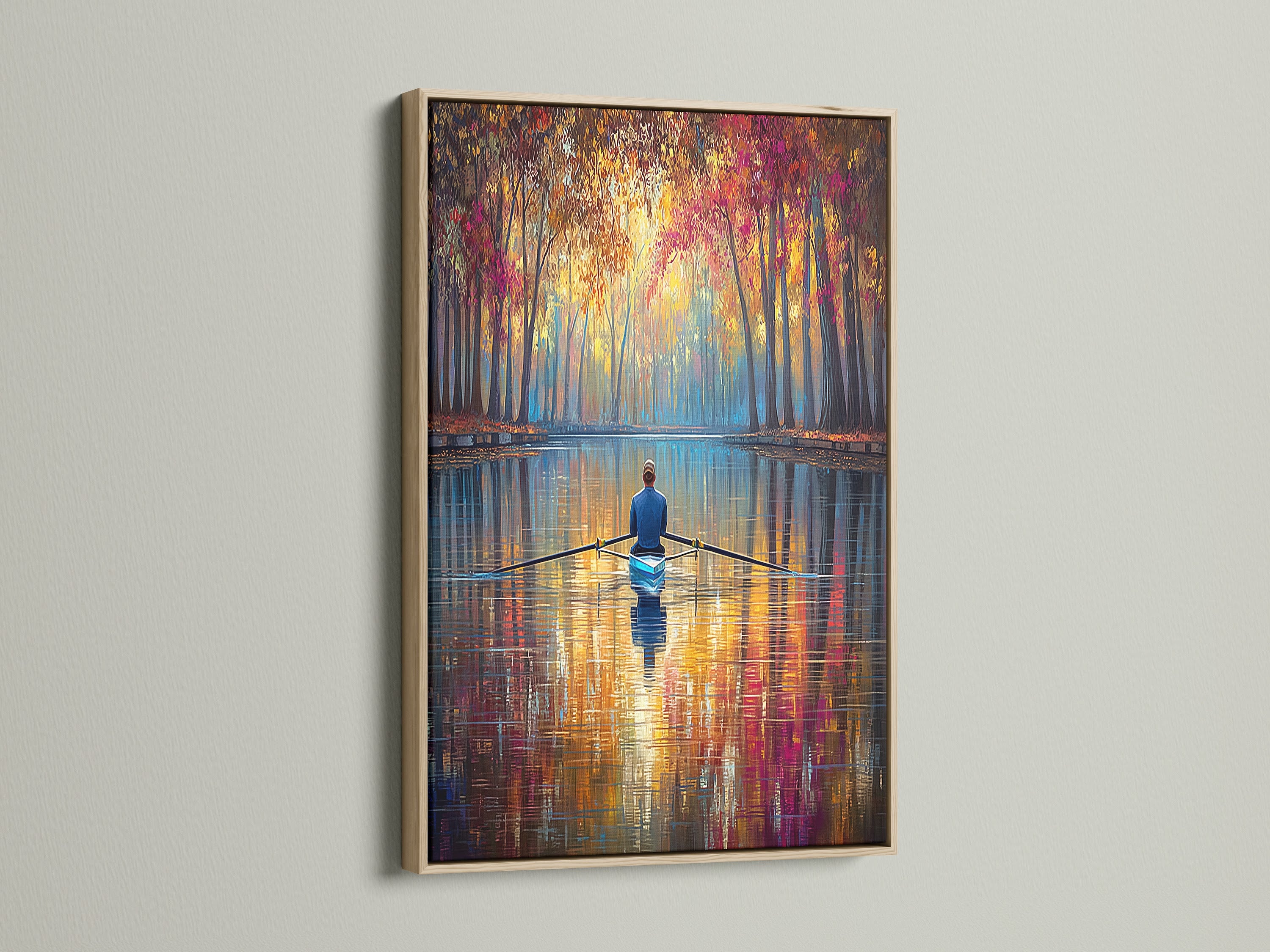 Experience the beauty of the Autumn Lake Wall Art in an oak frame. The warm tones of the frame enhance the artwork's fall colors. Notice the water reflection and scenic art details. This lake canvas print is ideal for nature-inspired home decor. Add a touch of tranquility to your space.