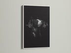 A dog heartbeat artwork is elegantly presented in a white frame. The clean white finish complements the black and white artwork. It is suitable for medical or home decor. View this contemporary art piece.