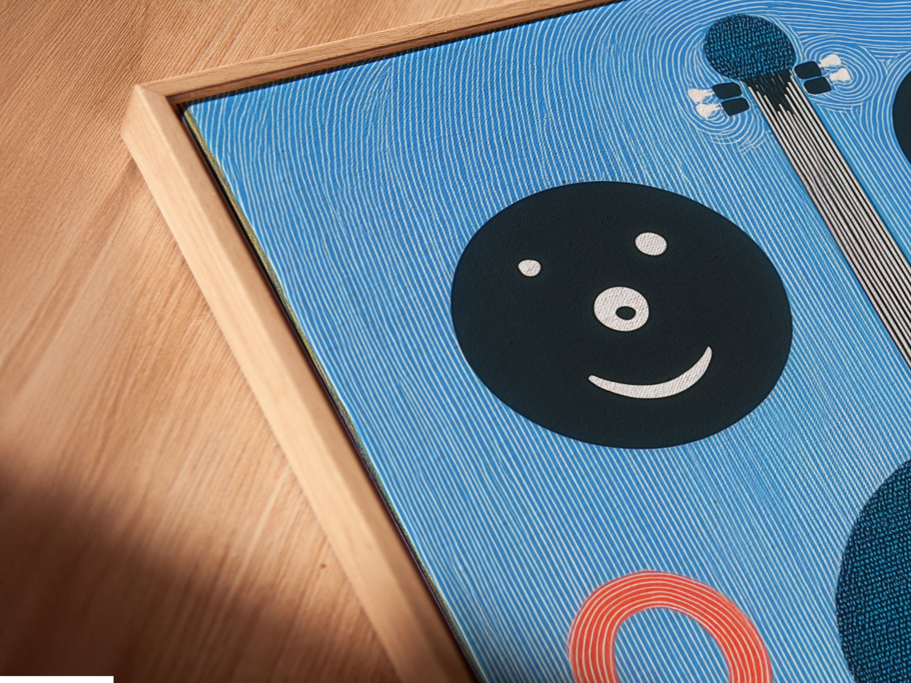 Close up angled view of a canvas print featuring abstract music instruments. The artwork is presented in a floating frame. It enhances the modern art print. Perfect for music themed spaces and art collectors.