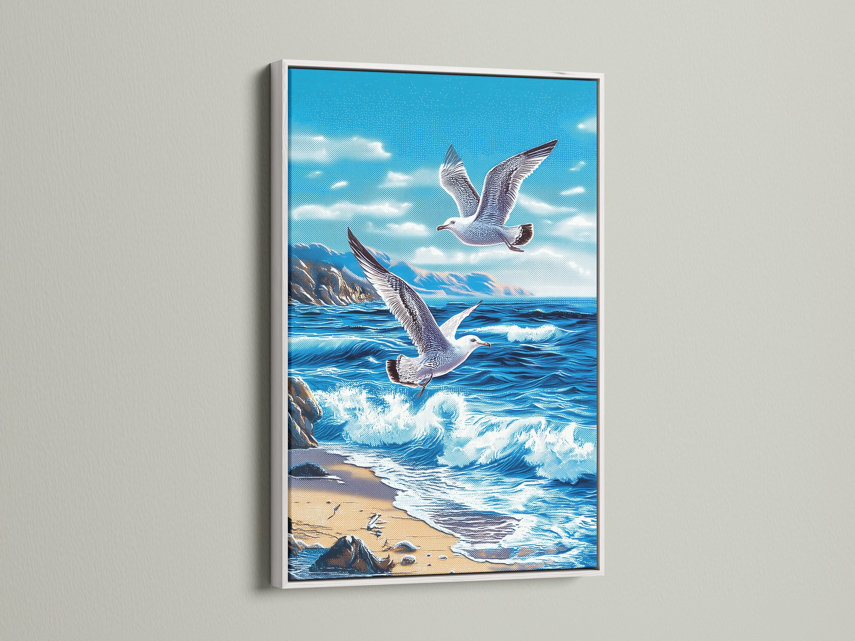 White frame artwork. The artwork shows seagulls in flight over a beautiful ocean view. The white frame offers a clean and modern aesthetic. It ensures the artwork remains the focal point adding brightness to any room it is displayed in.