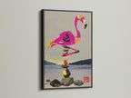 This image shows a flamingo balance art print. It is framed in a sleek black frame. The artwork combines a playful flamingo with a zen stone stack. The black frame adds a modern touch. It makes a statement in any room.