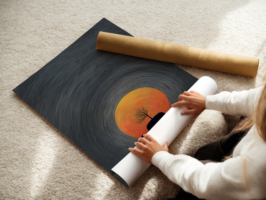 A woman carefully rolls a fine art poster paper. The whale sunset artwork is ready to be framed and displayed. This minimalist ocean art is perfect for coastal home decor. The poster captures the essence of surreal nautical style.