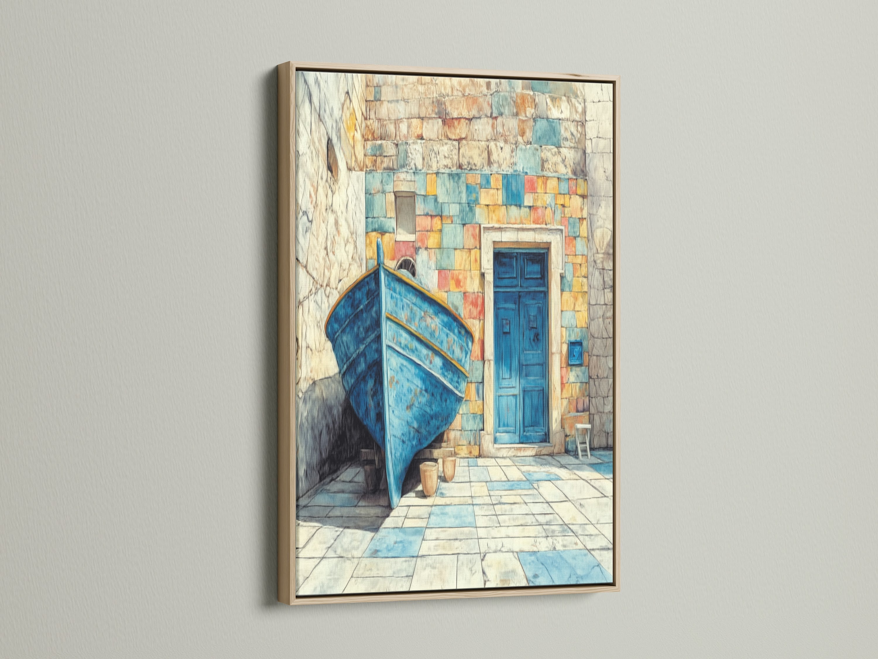 Coastal Boat Canvas Print in an oak frame. This Mediterranean wall art features turquoise blue artwork ideal for an entryway. Nautical decor adds a seaside touch to your space. Discover this azure blue print.