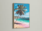 Tropical palm tree artwork showcased in an oak frame. The coastal wall art captures a serene beach scene with turquoise water and pink sand. It's perfect for adding a beachy touch to your home decor.