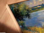 Angled close up of a canvas print in a floating frame. The floating frame gives the artwork a modern look. This frame highlights the artwork's edges. See the art from all angles. The frame enhances the artwork's depth.